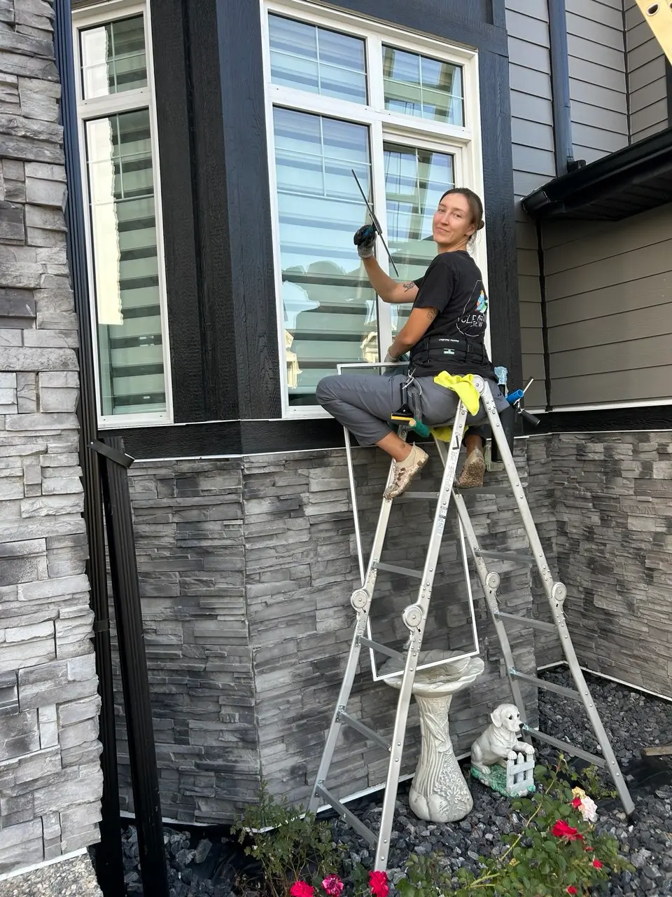 Crystal Touch cleaning windows before listing photos